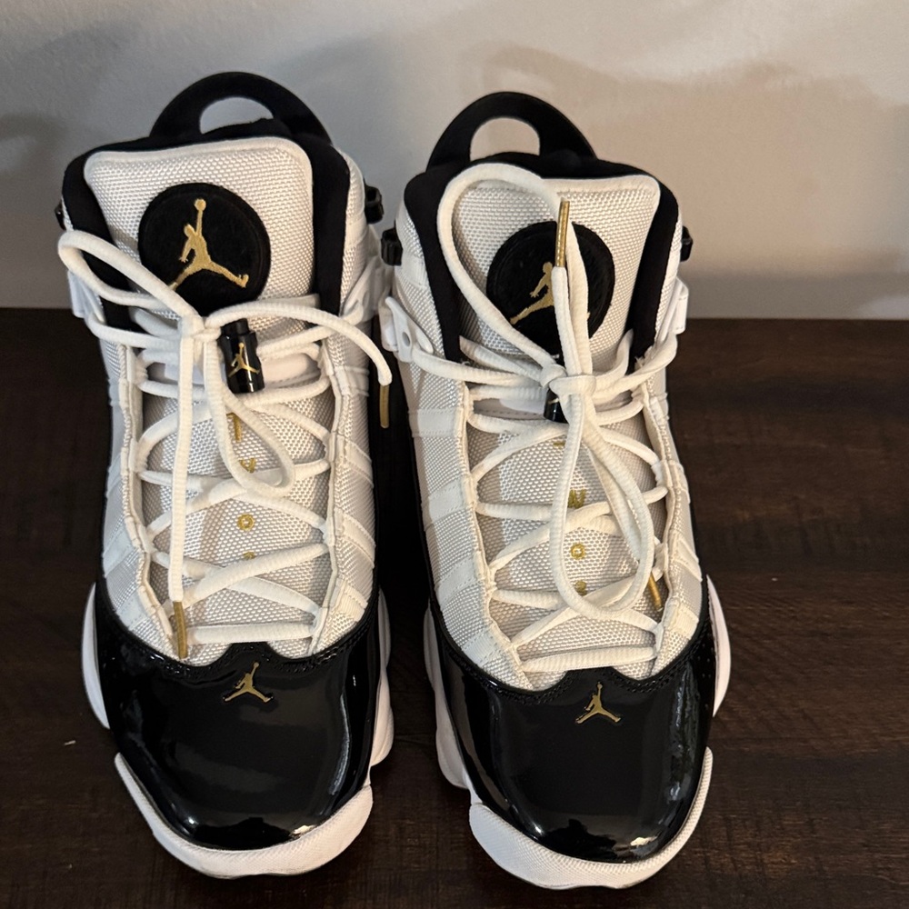 Jordan Black and White Sneakers with Gold Highlights